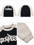 QURATEE Logo Raglan Long Sleeve – Black / Cream
